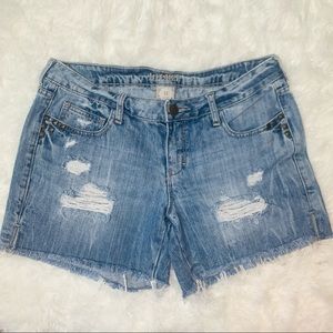 Decree destroyed denim shorts
